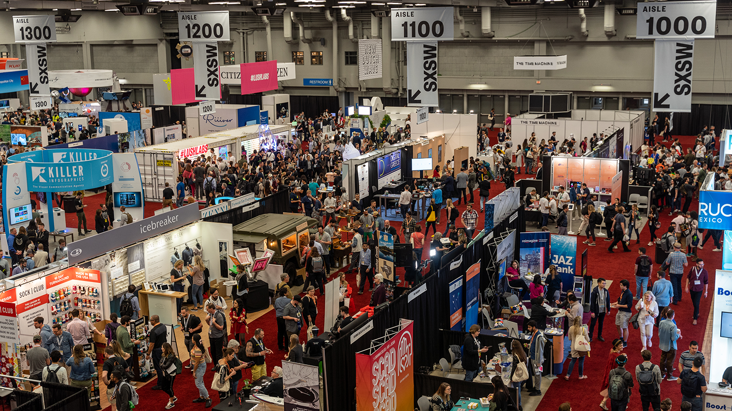 https://www.modev.com/hubfs/SXSW-Trade-Show-2019-photo-by-merrick-ales-1440x810.png